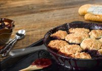 Closeup view of blackberry cobblers in a pan — Stock Photo