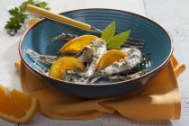 Breaded sardines with leaves — Stock Photo