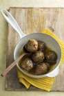 Meatballs in gravy in saucepan — Stock Photo