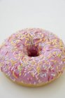 Pink iced doughnut — Stock Photo