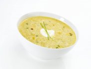Creamy sweetcorn soup in bowl — Stock Photo