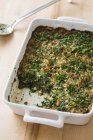 Spinach gratin in dish — Stock Photo