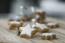 Cinnamon stars and a cutter — Stock Photo