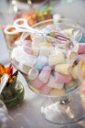 Jar of colourful marshmallows — Stock Photo