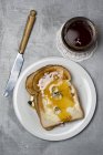 Slices of toast with honey — Stock Photo