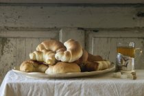 Freshly baked homemade crescent rolls — Stock Photo