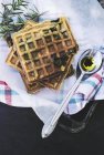 Savory waffles with spinach — Stock Photo