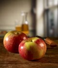 Red apples on table — Stock Photo