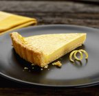 Slice of Lemon curd tart — Stock Photo