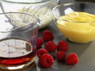 Closeup view of ingredients for Sherry trifle with raspberries — Stock Photo