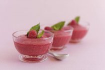 Elegant glasses of raspberry mousse — Stock Photo