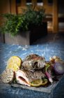 Cod with lemon and garlic — Stock Photo