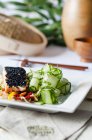 Steamed salmon with a black sesame crust — Stock Photo