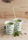 Cups of cold pea soup — Stock Photo