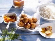 Salmon balls served with rice — Stock Photo