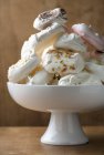 Meringues with flaked almonds — Stock Photo