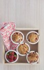 Strawberry muffins on wooden tray — Stock Photo