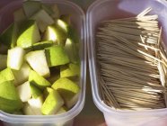 Diced pears and toothpicks — Stock Photo
