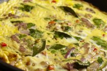 Masala omelette in frying pan — Stock Photo
