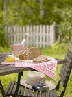 Wholemeal bread outdoors — Stock Photo