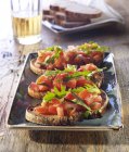 Bruschetta condita con pomodoro — Foto stock