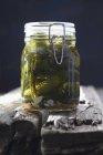 Jar of pickled gherkins — Stock Photo