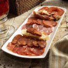Spanish charcuterie platter with Soria Picante — Stock Photo