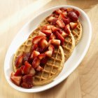 Waffles with organic strawberries — Stock Photo