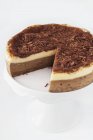 Sliced tiramisu cheesecake — Stock Photo