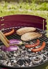 Sausages, aubergines and bread — Stock Photo