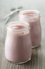 Blueberry yoghurt in jars — Stock Photo