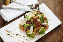 Marinated rabbit and chanterelle mushroom salad — Stock Photo