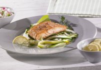 Salmon fillets on plate — Stock Photo