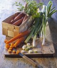 Arrangement of vegetables on desk — Stock Photo