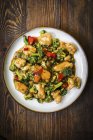 Chicken with broccoli and pepper — Stock Photo