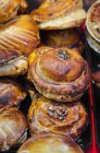 Closeup view of Alsatian Tourte Au Riesling pies heap — Stock Photo