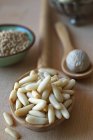 Pine nuts on spoon — Stock Photo