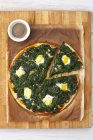 Pizza fiorentina with spinach — Stock Photo