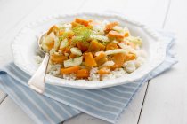 Fennel and carrot medley on rice — Stock Photo