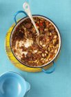 Top view of vegetable chilli with white beans — Stock Photo