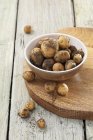 Fresh Drillinge potatoes in bowl — Stock Photo