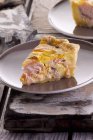 Slice of salmon tart with blue cheese — Stock Photo