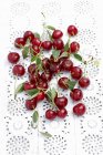 Sour cherries with leaves — Stock Photo