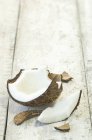 Fresh broken coconut — Stock Photo