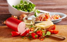 Sausage salad with lettuce — Stock Photo