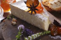Brie cheese with star anise — Stock Photo