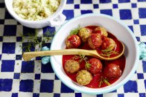 Fish dumplings in tomato sauce — Stock Photo