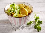 Fish curry with catfish and white cabbage — Stock Photo