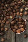 Hazelnuts in copper cup — Stock Photo