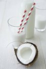 Coconut milk in glasses — Stock Photo